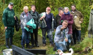The team move materials and tools to the first bench site, John Kay